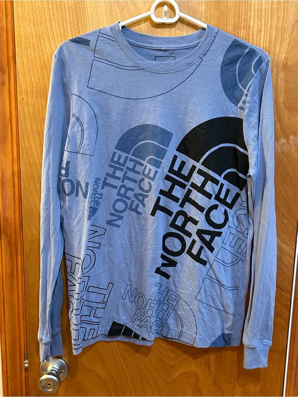 The North Face Women's Size Medium Long Sleeve Graphic T-Shirt Blue Black All Ov